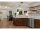 Renovated kitchen features stainless appliances, wood floors and natural lighting at 1700 E Lakeside Dr # 12, Gilbert, AZ 85234