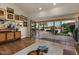 Bright living room with hardwood floors, sliding glass doors, and stylish decor at 1700 E Lakeside Dr # 12, Gilbert, AZ 85234