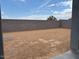 A spacious backyard with block fence offering privacy at 17425 W Eva St, Waddell, AZ 85355