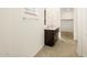 Bathroom featuring double sink vanity, ample counter space and neutral accents at 17425 W Eva St, Waddell, AZ 85355