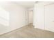 Bedroom featuring carpet, walk in closet and fresh paint at 17425 W Eva St, Waddell, AZ 85355