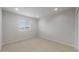 Bedroom featuring neutral carpet, window, and recessed lighting at 17782 W Getty Dr, Goodyear, AZ 85338
