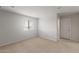 Bright bedroom featuring neutral carpet and a window providing natural light at 17782 W Getty Dr, Goodyear, AZ 85338