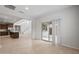 Spacious living area with a kitchen featuring an island and open floor plan at 17782 W Getty Dr, Goodyear, AZ 85338