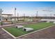 Engage in outdoor fun with cornhole, grilling, and lounging areas at this community amenity center at 37341 W San Clemente St, Maricopa, AZ 85138