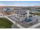 Barbecue area in community park with playground and sports courts at 37341 W San Clemente St, Maricopa, AZ 85138