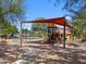 Well-equipped neighborhood playground featuring a variety of play structures for  at 37341 W San Clemente St, Maricopa, AZ 85138