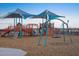 Community playground with climbing structures and swing sets for to enjoy at 37341 W San Clemente St, Maricopa, AZ 85138
