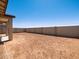 Large backyard featuring block wall fence and outdoor covered patio at 37373 W San Clemente St, Maricopa, AZ 85138