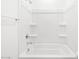 Close up of the white combined bath and shower at 37373 W San Clemente St, Maricopa, AZ 85138