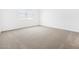 Bright bedroom features neutral carpet and a window at 37373 W San Clemente St, Maricopa, AZ 85138