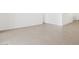 Spacious living area with tile flooring, ideal for entertaining guests and relaxing at 37373 W San Clemente St, Maricopa, AZ 85138