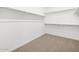 Spacious walk-in closet with ample hanging space, perfect for organization and storage at 37373 W San Clemente St, Maricopa, AZ 85138