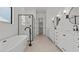 Contemporary bathroom featuring a soaking tub and glass-enclosed shower at 42064 N Golden Trl, San Tan Valley, AZ 85140