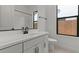 Modern bathroom vanity with double sinks and stylish fixtures at 42064 N Golden Trl, San Tan Valley, AZ 85140