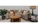 Relaxing living room displays comfortable seating, a decorative coffee table, and neutral decor at 42064 N Golden Trl, San Tan Valley, AZ 85140