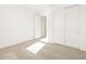 Bedroom with a closet for storage at 4347 W Hannah St, San Tan Valley, AZ 85144