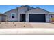 Charming single-Gathering home with a two-car garage and low maintenance desert landscaping at 4347 W Hannah St, San Tan Valley, AZ 85144