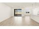 Open-concept living area with large sliding glass doors to patio at 4347 W Hannah St, San Tan Valley, AZ 85144