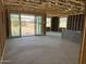 Spacious living room framing with large sliding glass doors offering great backyard views at 7603 W Avenida Del Rey --, Peoria, AZ 85383