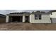 Exterior view of home in progress featuring garage, front entry, and stacked roof tiles at 7736 W Coyote Dr, Peoria, AZ 85383