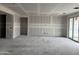 Spacious living room with sliding doors and a bright open space at 7736 W Coyote Dr, Peoria, AZ 85383