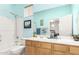Well-lit bathroom offers ample counter space and a combined tub and shower with modern fixtures at 15140 E Staghorn Dr, Fountain Hills, AZ 85268
