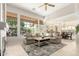 Bright living room featuring an open floorplan and large windows with a view of the backyard at 15140 E Staghorn Dr, Fountain Hills, AZ 85268