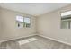 Bright bedroom with neutral walls, carpet floor and windows providing natural light at 15587 S 180Th Ln, Goodyear, AZ 85338