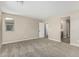 Spacious bedroom with neutral walls, carpet flooring, and an open doorway at 15587 S 180Th Ln, Goodyear, AZ 85338