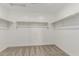 Walk-in closet with carpeted floor and shelving for maximum storage at 15587 S 180Th Ln, Goodyear, AZ 85338