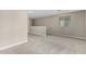 Spacious upstairs loft area featuring neutral walls, carpet flooring, and a window at 15587 S 180Th Ln, Goodyear, AZ 85338