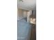 Upstairs hallway with plush carpeting and views of the first floor below at 15587 S 180Th Ln, Goodyear, AZ 85338