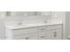 Modern bathroom with double sinks, drawers and cabinets at 17561 W Pierson St, Goodyear, AZ 85395