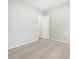 Neutral bedroom with carpet and a view of an open door at 17561 W Pierson St, Goodyear, AZ 85395