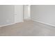 Neutral bedroom with carpet and a view of doors at 17561 W Pierson St, Goodyear, AZ 85395