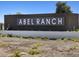 An attractive welcome sign for the Abel Ranch community at 17561 W Pierson St, Goodyear, AZ 85395