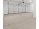 Spacious two car garage with ample room for storage and a large insulated door at 17561 W Pierson St, Goodyear, AZ 85395