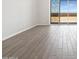 View of the outdoor patio through sliding glass doors with tile flooring at 17561 W Pierson St, Goodyear, AZ 85395