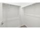 Empty walk-in closet with shelving at 17561 W Pierson St, Goodyear, AZ 85395