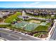 Community courts, including basketball and sand volleyball, in a well-maintained park at 196 W Yellow Wood Ave, San Tan Valley, AZ 85140