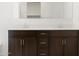 Double sink bathroom vanity with dark wood cabinetry and clean, modern lines at 4348 W Hannah St, San Tan Valley, AZ 85144