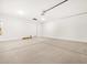 Spacious garage with large garage door and utility hookups at 4348 W Hannah St, San Tan Valley, AZ 85144