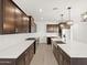 New kitchen showcasing an island, gas cooktop and stainless steel appliances at 4348 W Hannah St, San Tan Valley, AZ 85144