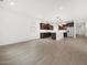 Large open-concept kitchen with stainless steel appliances, granite counters, and a large pantry at 4348 W Hannah St, San Tan Valley, AZ 85144