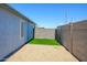 Low maintenance backyard with artificial grass and gravel, great for outdoor living at 11501 W Charter Oak Rd, El Mirage, AZ 85335