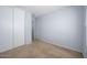 Carpeted bedroom with built-in closet at 11501 W Charter Oak Rd, El Mirage, AZ 85335