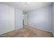 Carpeted bedroom featuring a closet at 11501 W Charter Oak Rd, El Mirage, AZ 85335