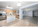 Well-appointed kitchen featuring stainless steel appliances, tile flooring, and an open layout perfect for cooking and entertaining at 11501 W Charter Oak Rd, El Mirage, AZ 85335