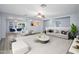 Open-concept living space featuring a seamless flow between the living and dining areas, enhancing everyday living at 11501 W Charter Oak Rd, El Mirage, AZ 85335